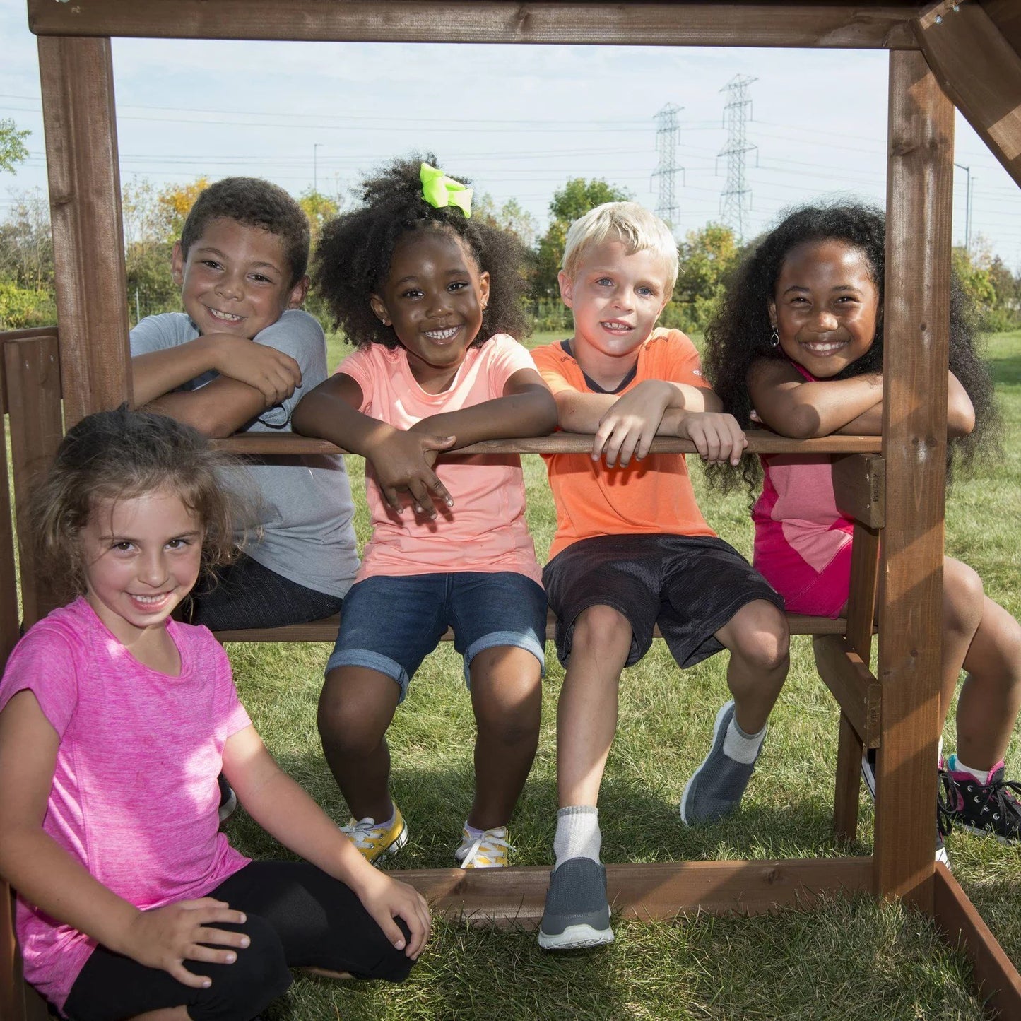 Swing-N-Slide WS 8353 Knightsbridge Deluxe Wooden Swing Set with Two Slides Climbing Wall Swings Glider & Picnic Table Wood