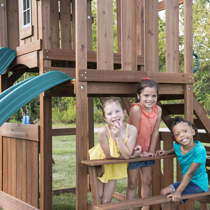 Swing-N-Slide WS 8353 Knightsbridge Deluxe Wooden Swing Set with Two Slides Climbing Wall Swings Glider & Picnic Table Wood